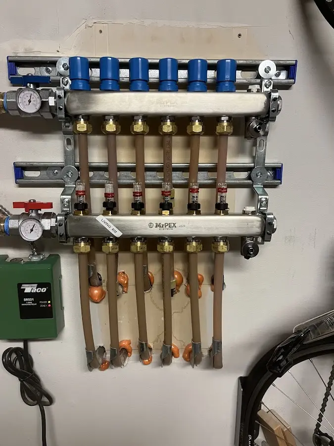 Plumber performing Water Heater Repair at a residential property in Senatobia